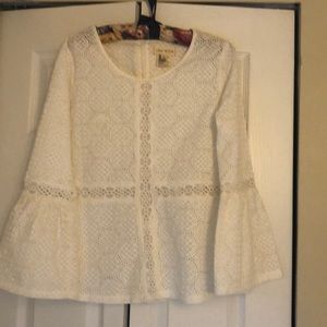 Long sleeves 100% cotton top.